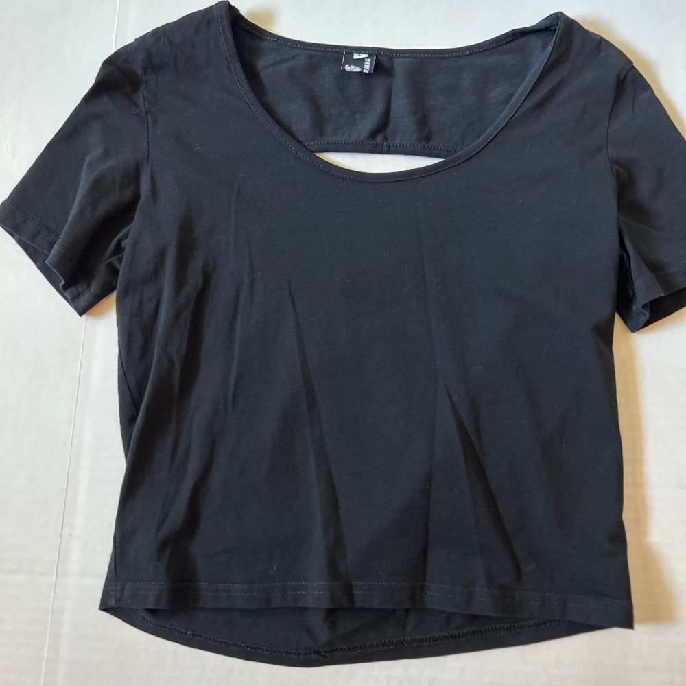 Black women's top, cut out in back, size L